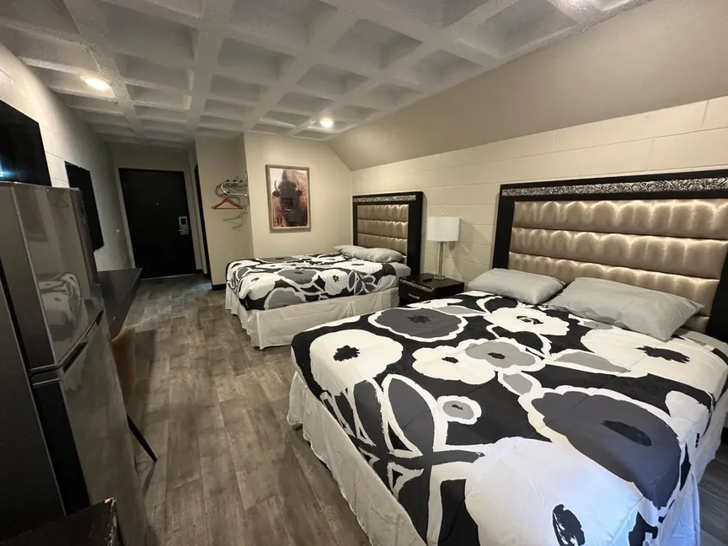 Two beds in modern hotel room