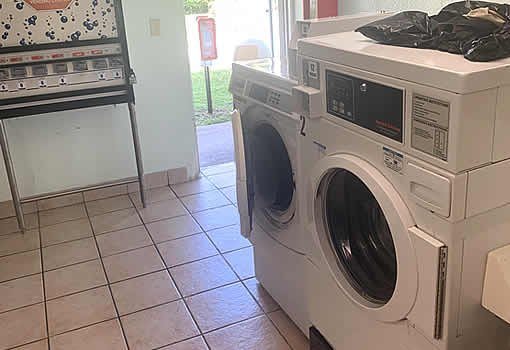 Coin-operated guest laundry at The Hastings Inn Parsons, Kansas