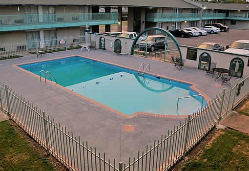 Seasonal outdoor pool at The Hastings Inn Parsons, Kansas